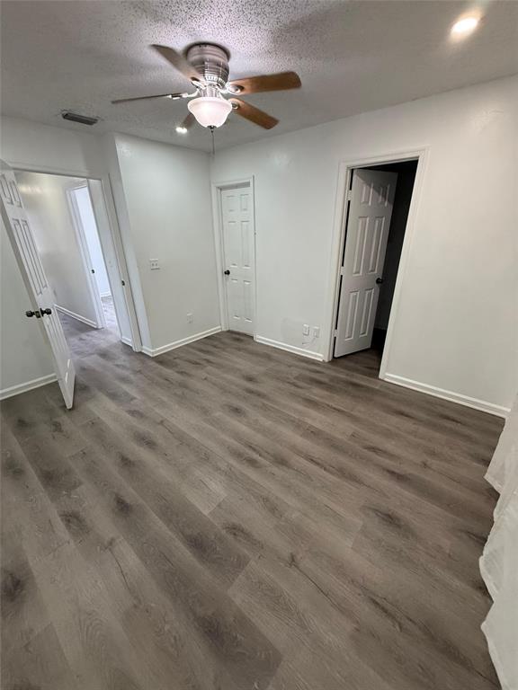 4243 Northwest 68 Way, Unit 4243 Fort Lauderdale, FL 33319 - Photo 15 of 15 a view of an empty room with a chandelier fan