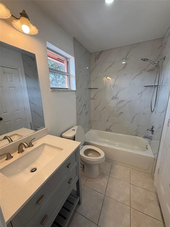 4243 Northwest 68 Way, Unit 4243 Fort Lauderdale, FL 33319 - Photo 7 of 15 a bathroom with a sink a toilet and bathtub