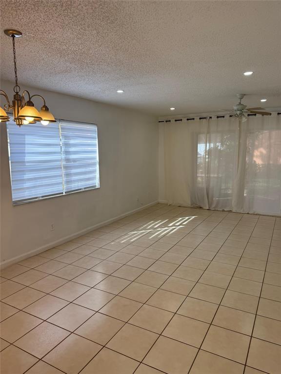 4243 Northwest 68 Way, Unit 4243 Fort Lauderdale, FL 33319 - Photo 10 of 15 a view of an empty room and a window