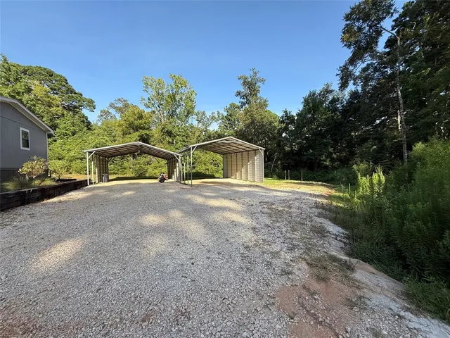 a house with trees in front of it