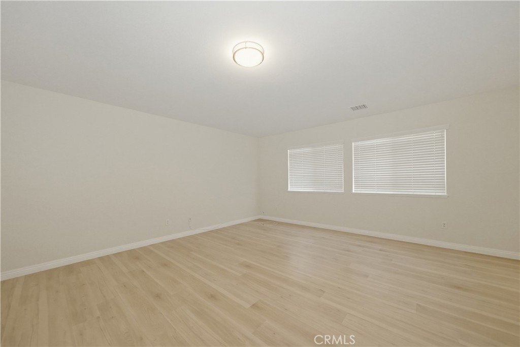 6710 Black Hawk Road Eastvale, CA 92880 - Photo 27 of 49 an empty room with a empty space and window