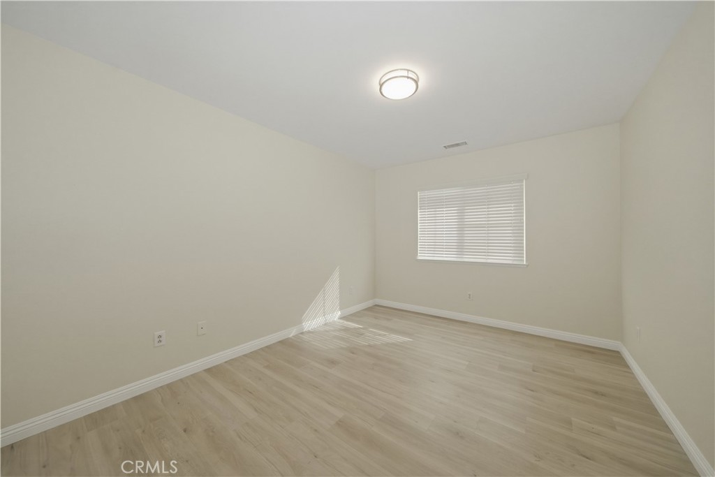 6710 Black Hawk Road Eastvale, CA 92880 - Photo 34 of 49 an empty room with a workbench