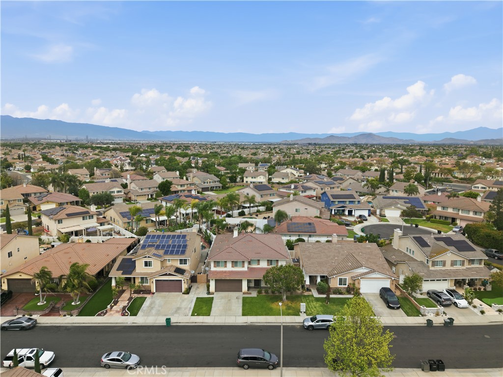 6710 Black Hawk Road Eastvale, CA 92880 - Photo 47 of 49 an aerial view of residential building with outdoor space