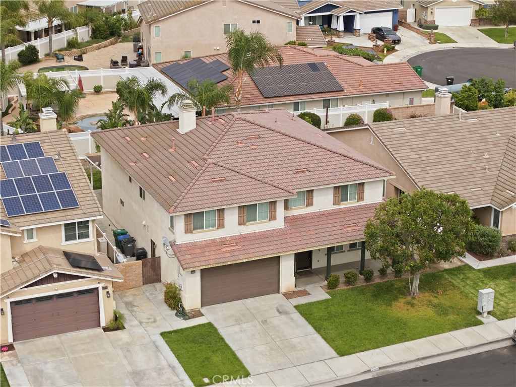 6710 Black Hawk Road Eastvale, CA 92880 - Photo 49 of 49 a aerial view of a brick house next to a yard