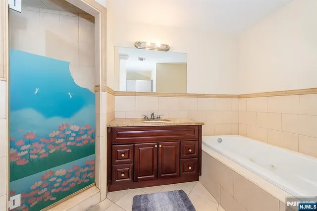 a bathroom with a sink and a bathtub