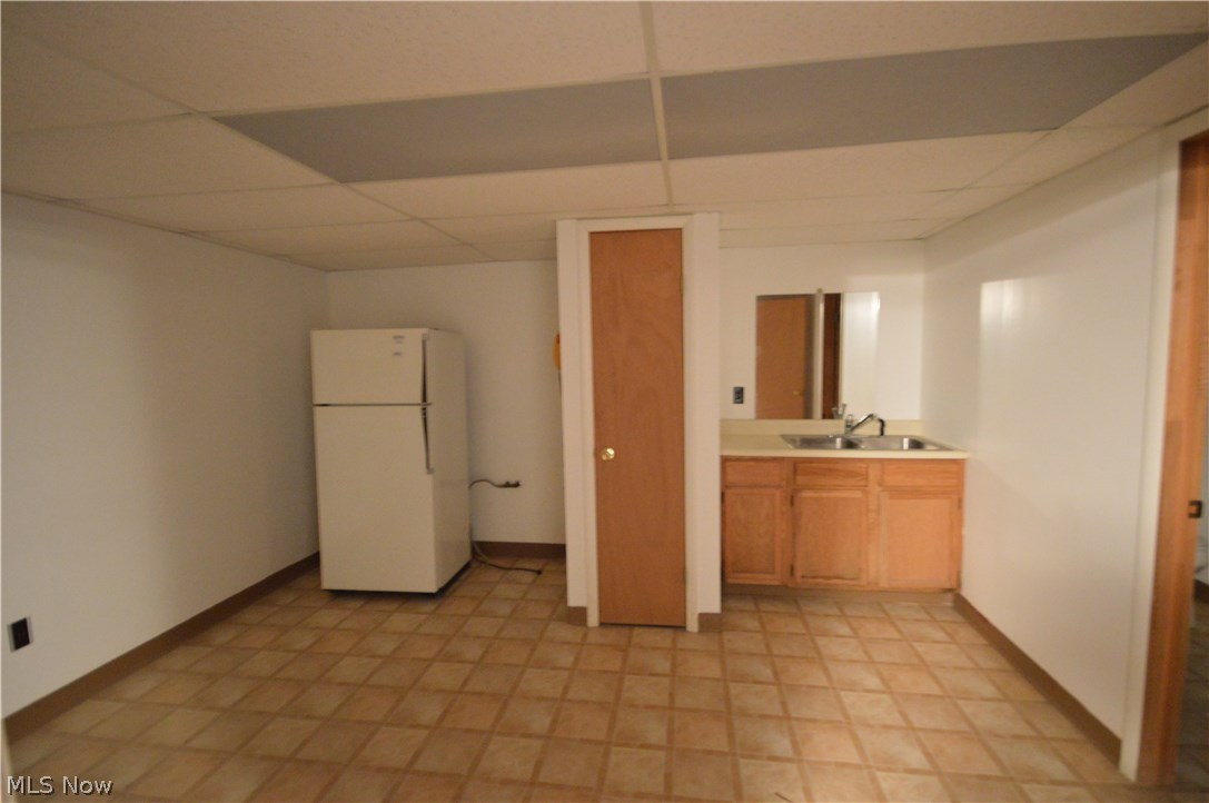 4117 Wheeler Creek Road Geneva, OH 44041 - Photo 22 of 24 2nd kitchen on lower level. Room for a table to the left side of picture.