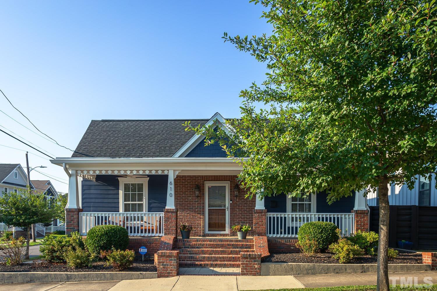 610 East Martin Street Raleigh, NC 27601 - Photo 1 of 40 a view of a house with a tree in front