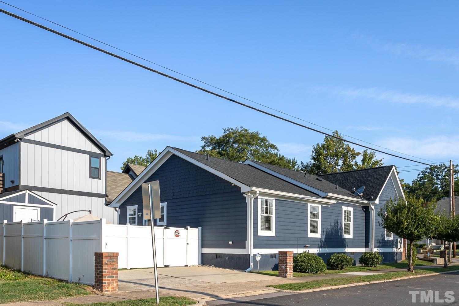 610 East Martin Street Raleigh, NC 27601 - Photo 28 of 40 a front view of a house with a yard