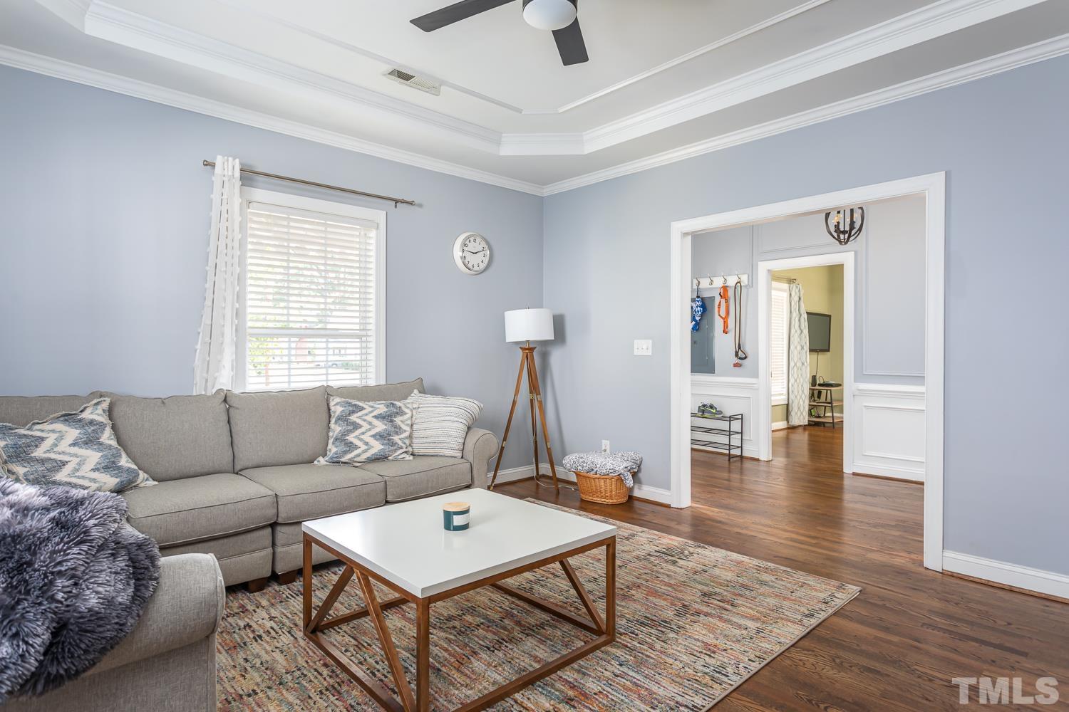 610 East Martin Street Raleigh, NC 27601 - Photo 5 of 40 a living room with furniture and a window