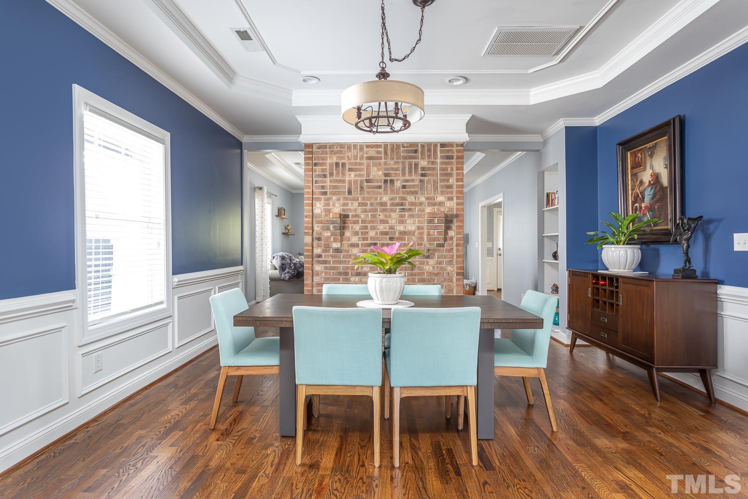 610 East Martin Street Raleigh, NC 27601 - Photo 8 of 40 a view of a dining room with furniture window and wooden floor