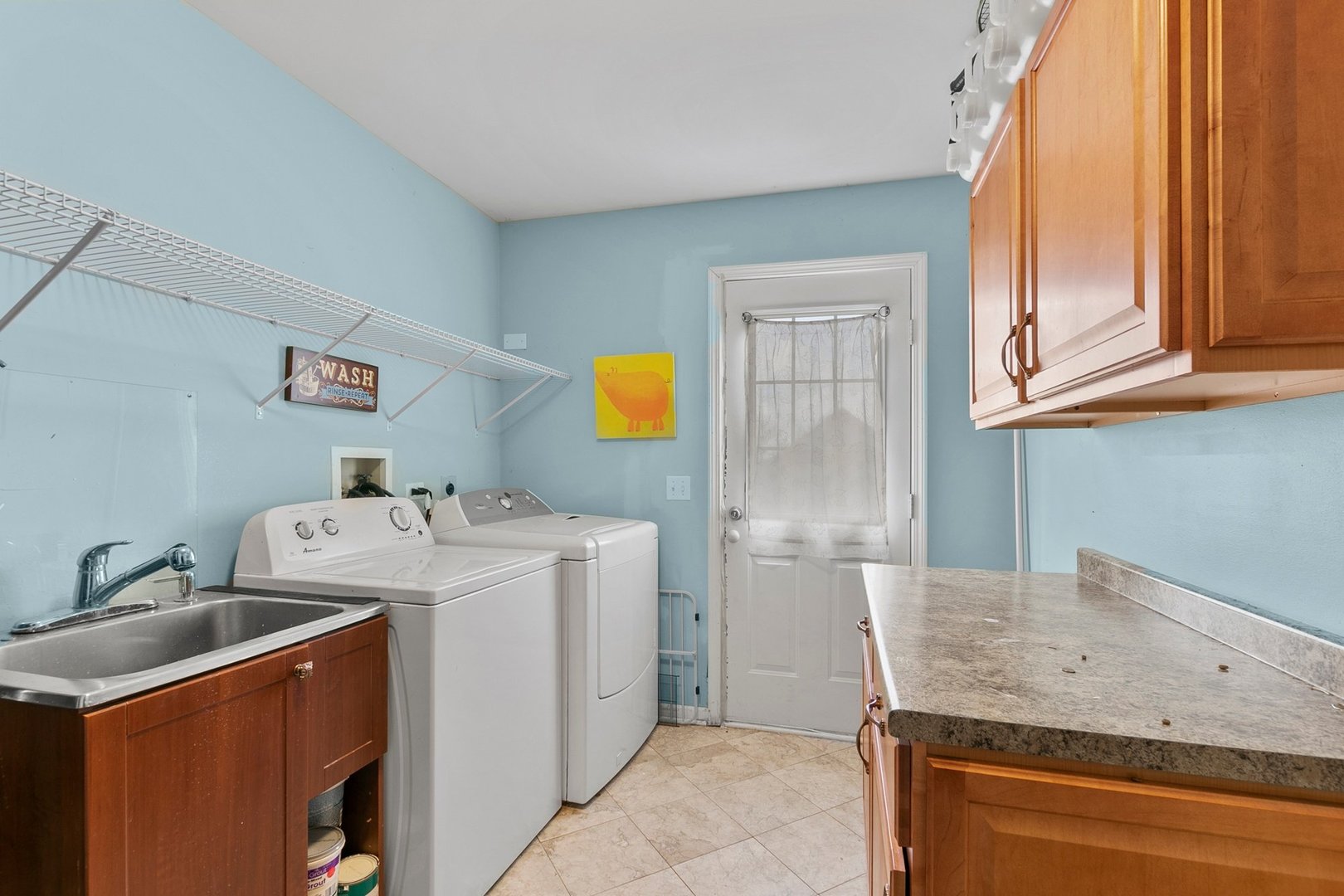 323 Bryan Drive Cary, IL 60013 - Photo 16 of 21 a utility room with dryer and washer