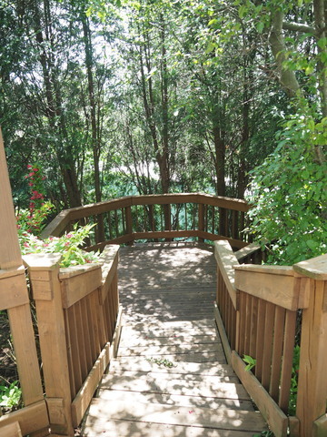323 Bryan Drive Cary, IL 60013 - Photo 18 of 21 a view of a balcony with wooden fence