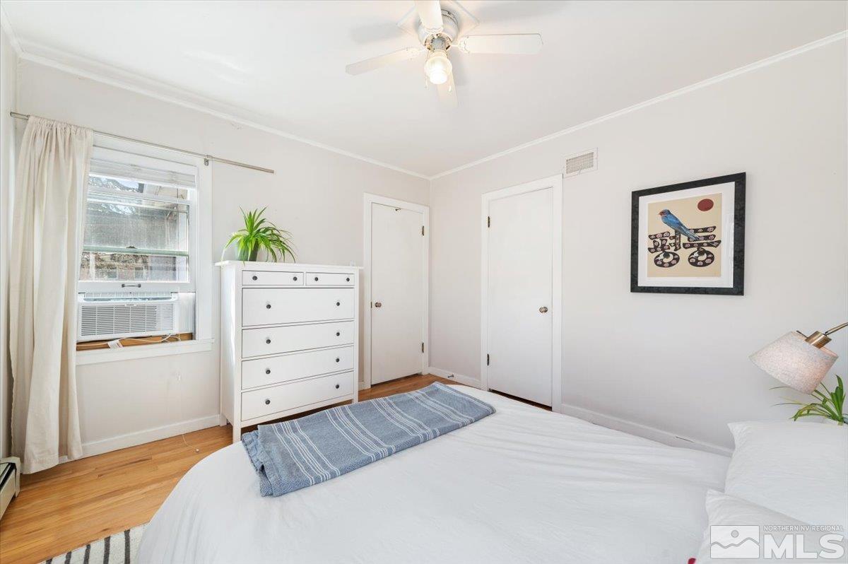 1250 Watt Street Reno, NV 89509 - Photo 20 of 33 a bedroom with a bed and a dresser