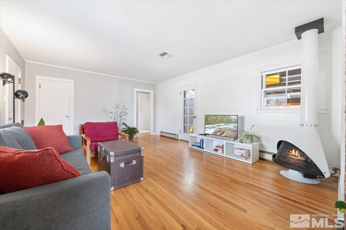 1250 Watt Street Reno, NV 89509 - Photo 9 of 33 a living room with furniture and a wooden floor