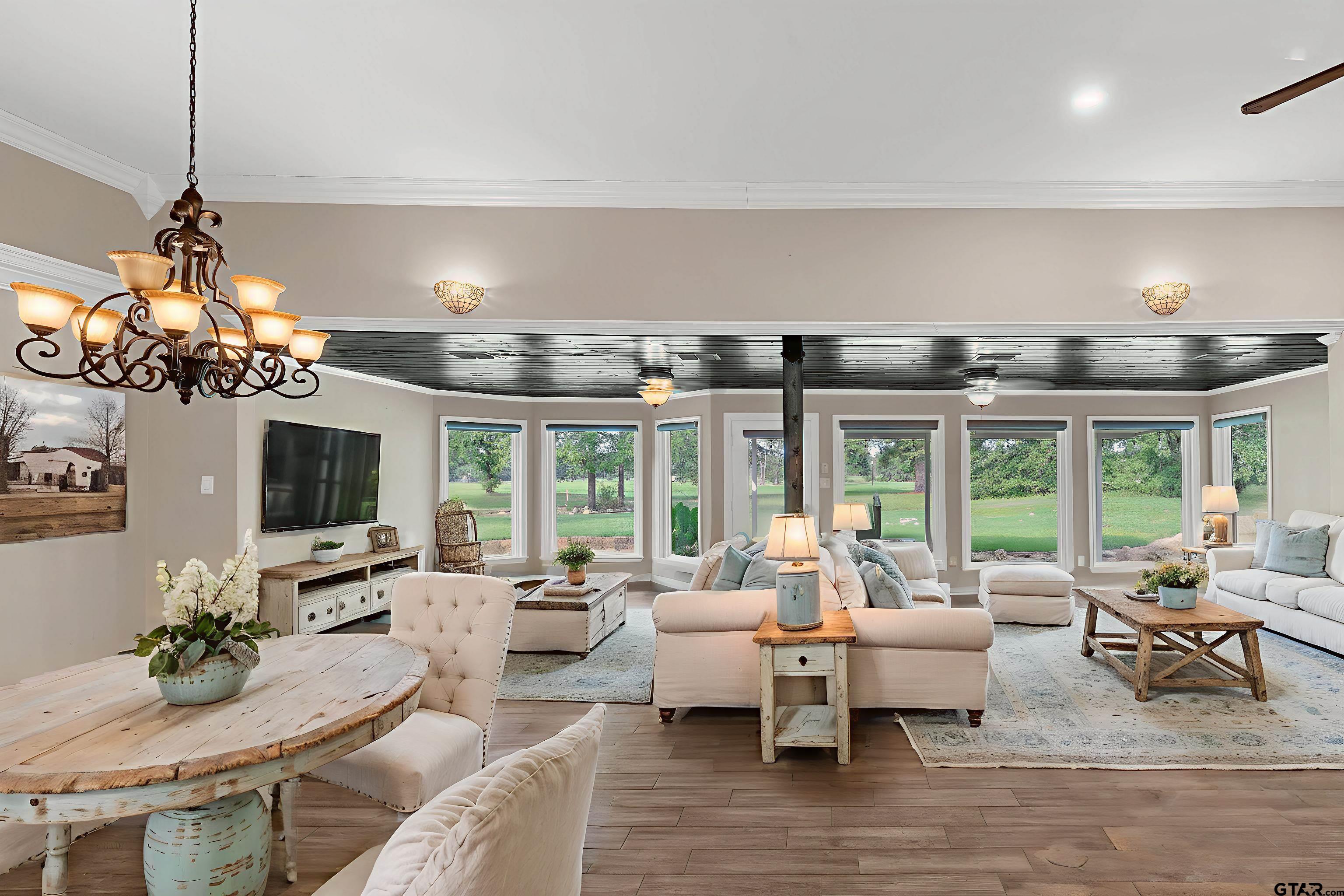 473 Cupit Street Longview, TX 75604 - Photo 12 of 48 virtually staged dining and sunroom area