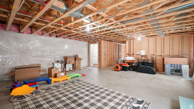 6062 Spring Street Stansbury Park, UT 84074 - Photo 24 of 36 Unfinished basement featuring exposed wood joists and concrete flooring