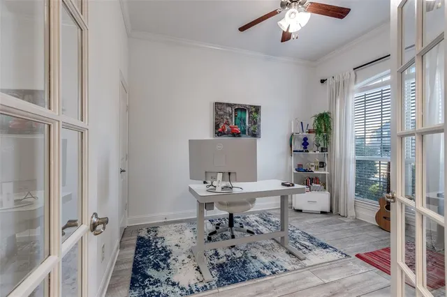 a workspace with furniture and a window