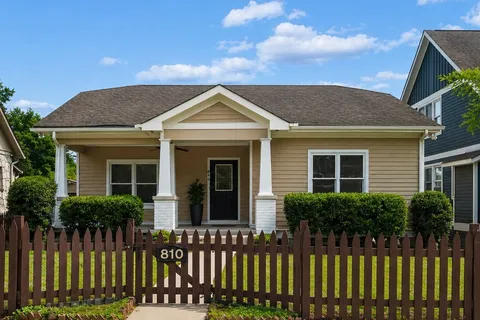 a front view of a house with a porch