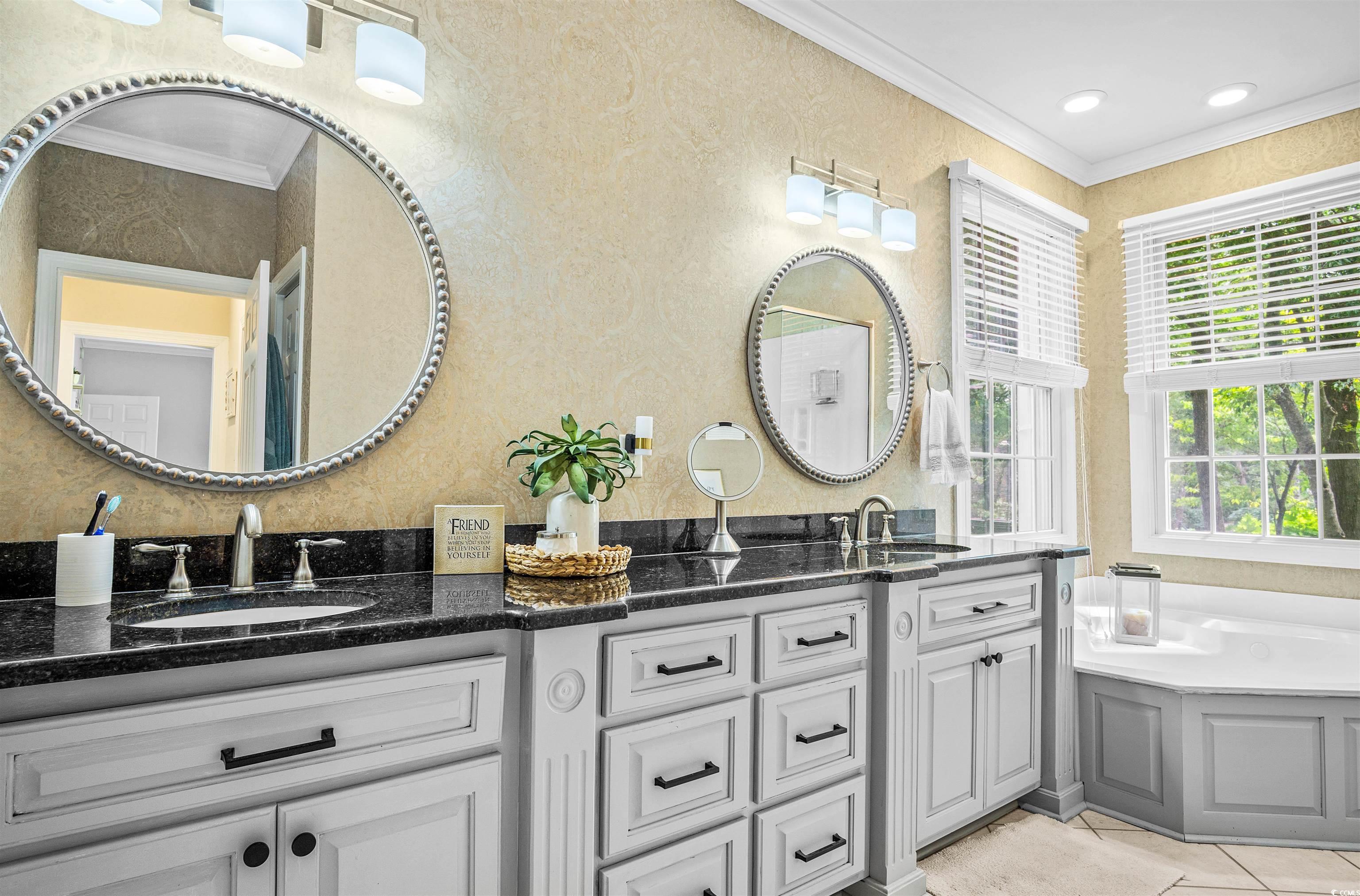 1079 Waterway Lane Myrtle Beach, SC 29572 - Photo 19 of 38 Bathroom with a shower stall, a whirlpool tub, and crown molding