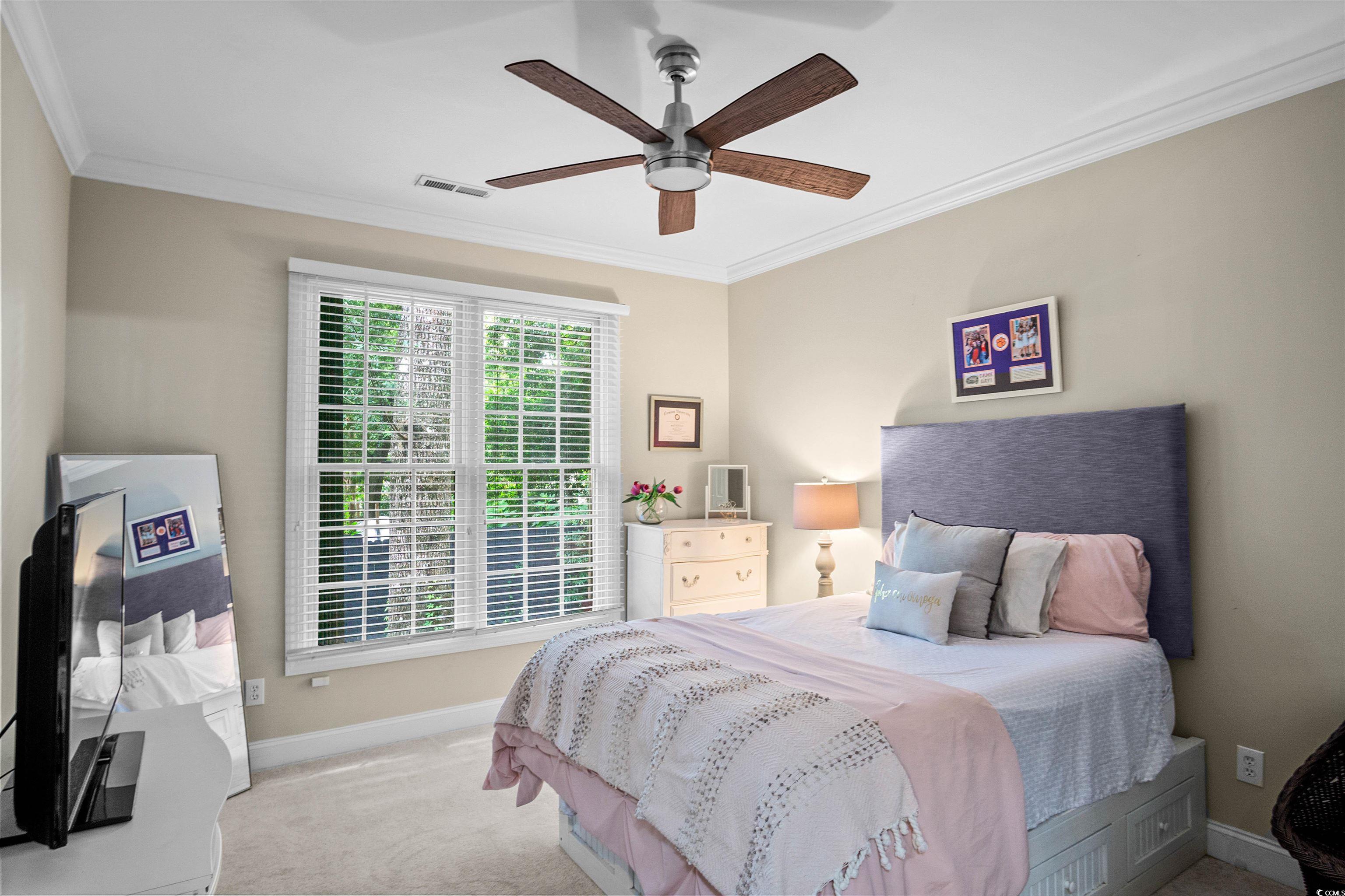 1079 Waterway Lane Myrtle Beach, SC 29572 - Photo 22 of 38 Bedroom featuring crown molding, light carpet, and ceiling fan