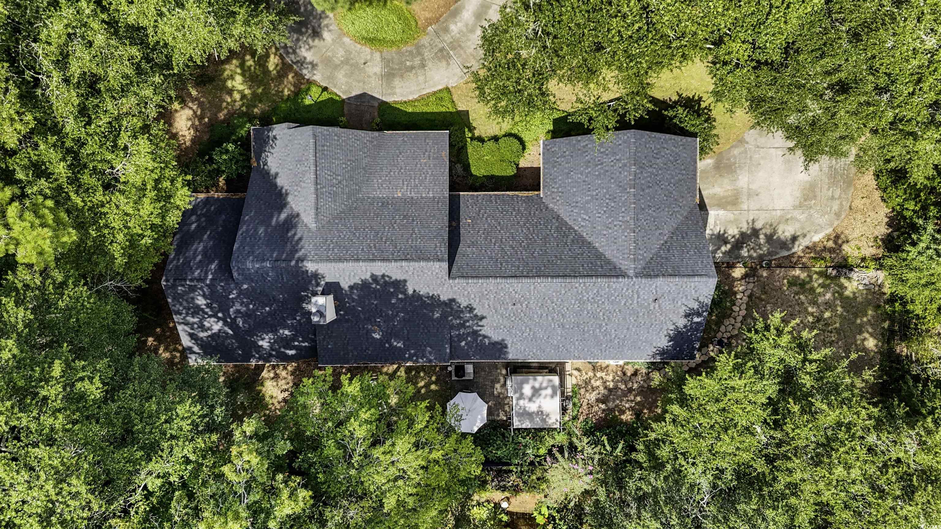 1079 Waterway Lane Myrtle Beach, SC 29572 - Photo 27 of 38 View of front of house with covered porch, brick siding, and roof with shingles