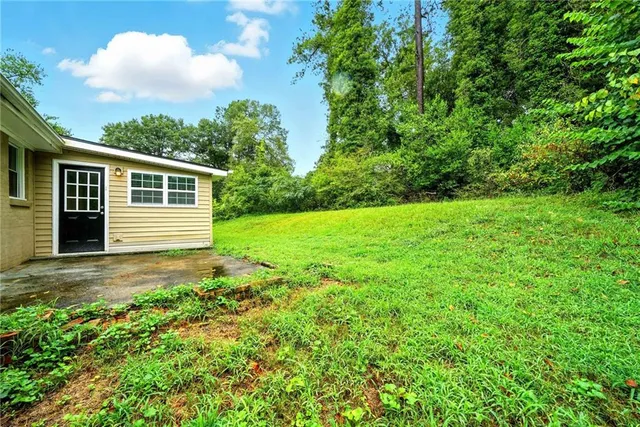 a house view with a garden space