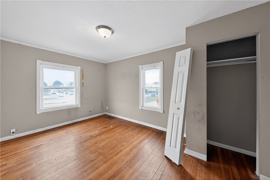 205 Rita Street Dayton, OH 45404 - Photo 14 of 34 This bright room features warm hardwood flooring, ready for your personal touch.