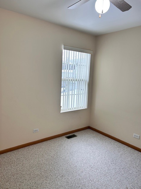623 Waterview Court Naperville, IL 60563 - Photo 21 of 22 an empty room with a window