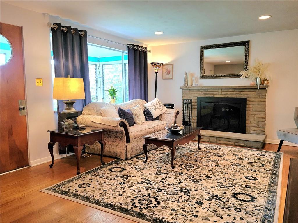 5184 Richland Road Gibsonia, PA 15044 - Photo 5 of 23 a living room with furniture and a fireplace
