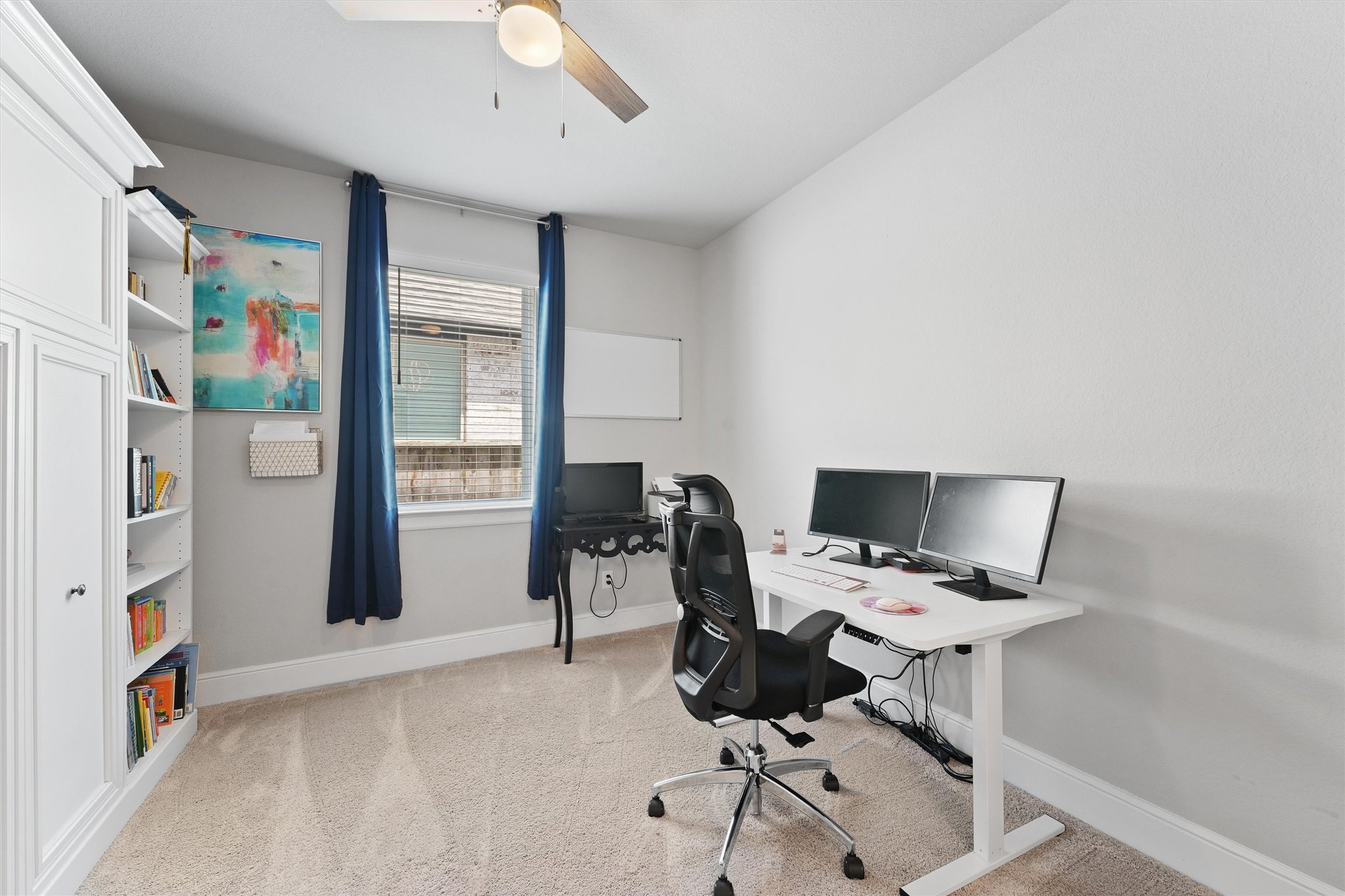 4050 Shackleton Court Iowa Colony, TX 77583 - Photo 21 of 48 a view of a workspace with furniture and a window