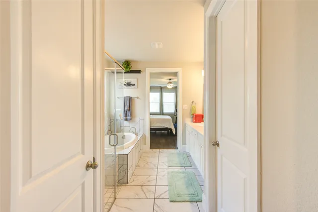a view of an entryway with wooden floor