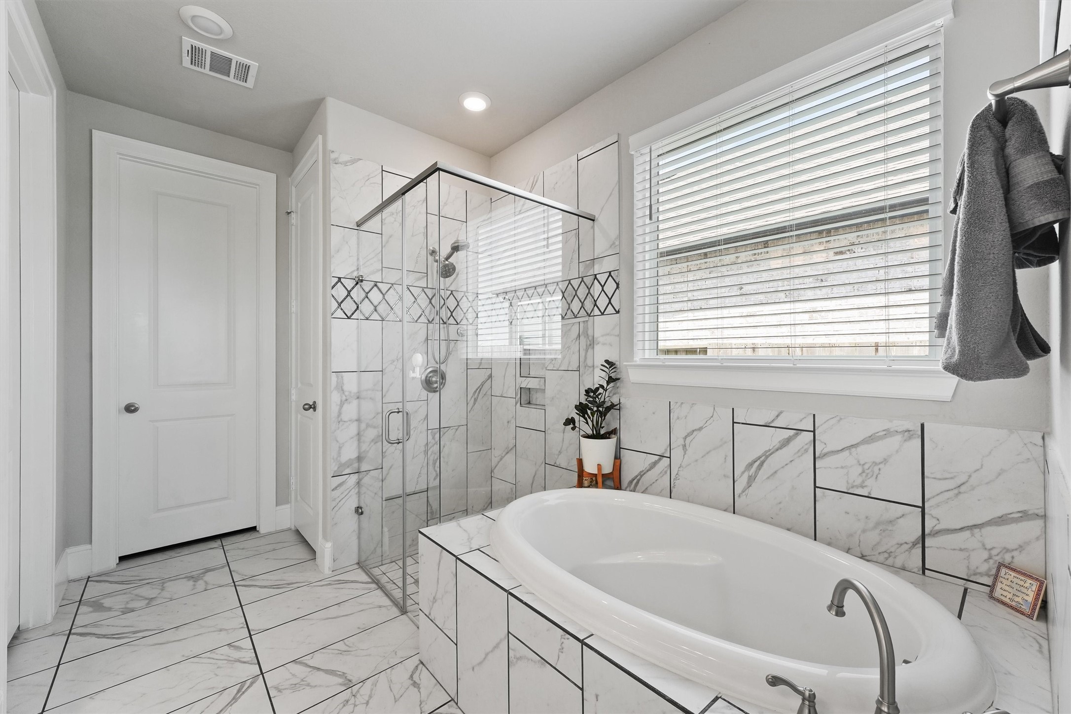 4050 Shackleton Court Iowa Colony, TX 77583 - Photo 29 of 48 a bathroom with a sink a toilet and shower