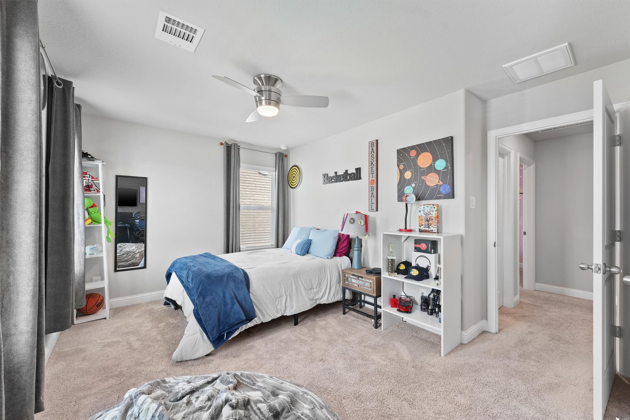 4050 Shackleton Court Iowa Colony, TX 77583 - Photo 40 of 48 a living room with a bed furniture and a window