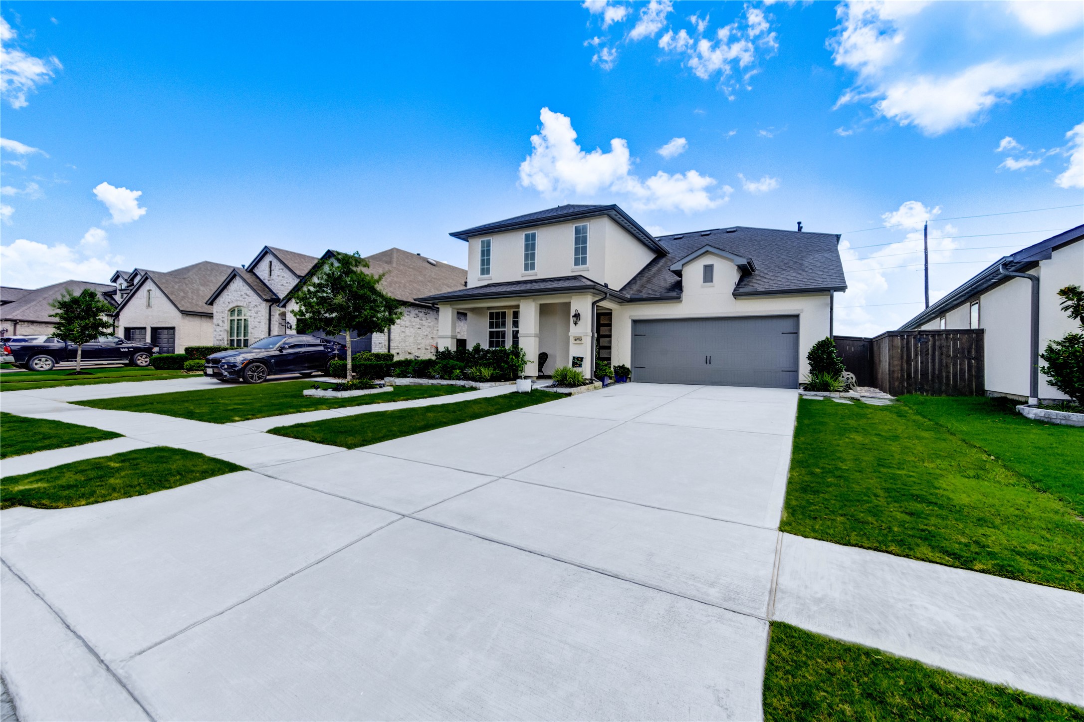 4050 Shackleton Court Iowa Colony, TX 77583 - Photo 4 of 48 a front view of a house with a yard and garage