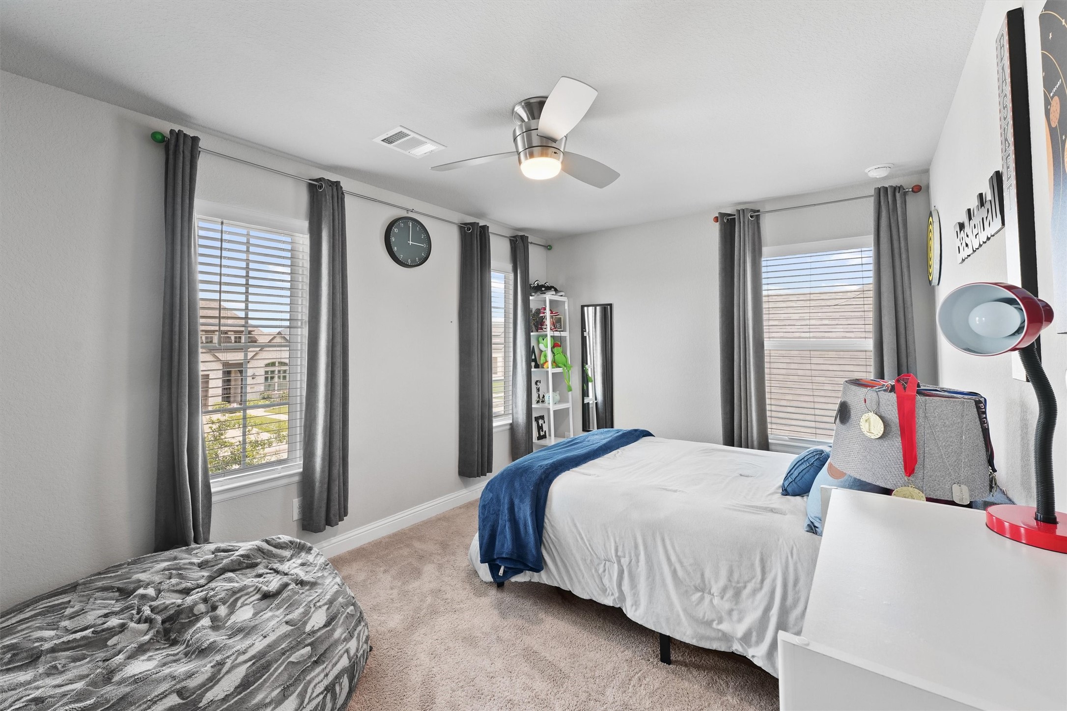 4050 Shackleton Court Iowa Colony, TX 77583 - Photo 41 of 48 a bedroom with a large bed and a window