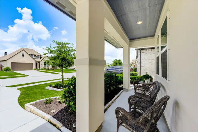 a view of yard with patio