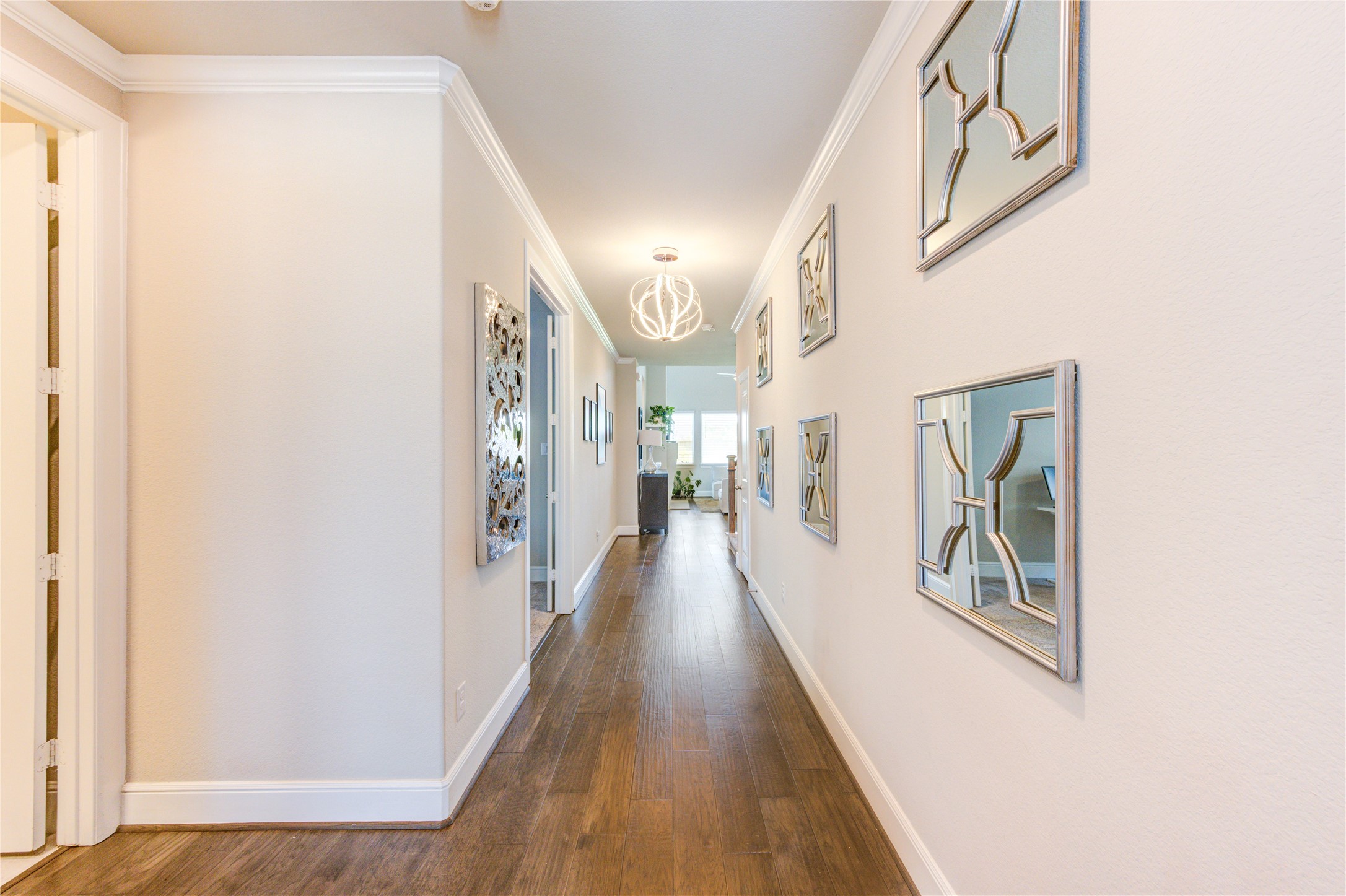4050 Shackleton Court Iowa Colony, TX 77583 - Photo 9 of 48 a view of a hallway view with wooden floor and staircase