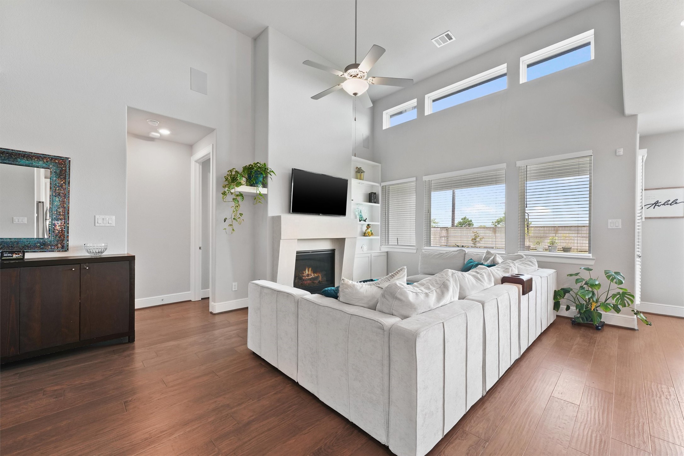 4050 Shackleton Court Iowa Colony, TX 77583 - Photo 10 of 48 a living room with furniture fireplace and flat screen tv