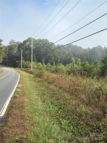 a view of a yard with an outdoor space