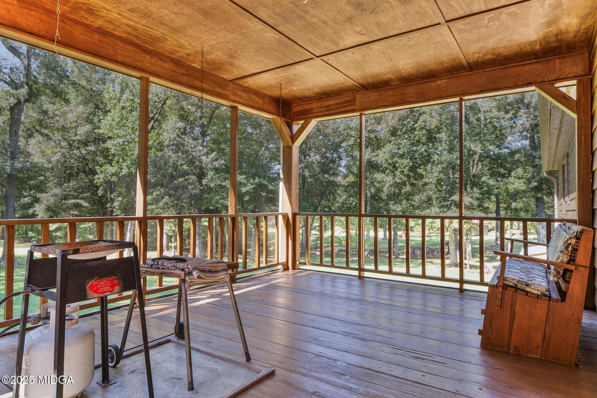 369 Abares Road Forsyth, GA 31029 - Photo 17 of 55 screened back porch