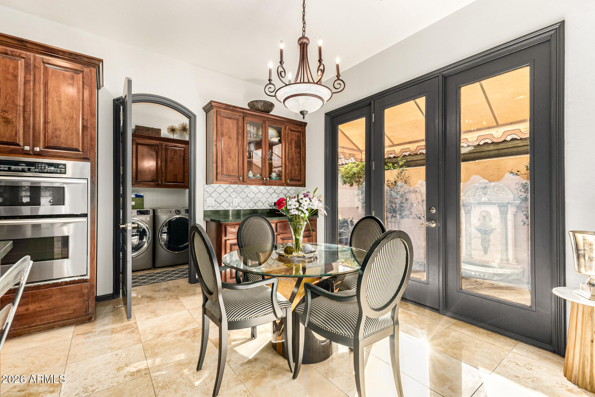 3418 East Pyrenees Pass Phoenix, AZ 85018 - Photo 17 of 46 a view of a dining room with furniture window and outside view