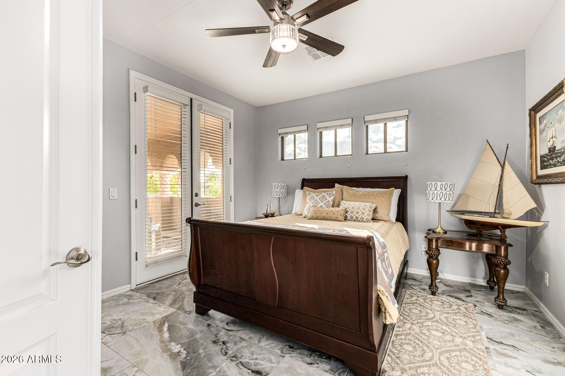 3418 East Pyrenees Pass Phoenix, AZ 85018 - Photo 21 of 46 a bed room with a bed and a window