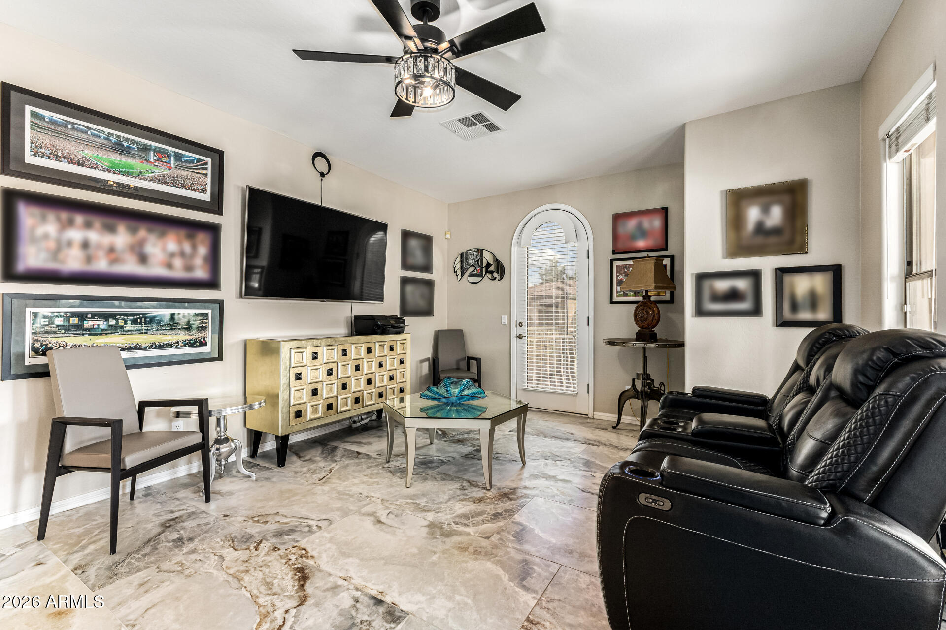 3418 East Pyrenees Pass Phoenix, AZ 85018 - Photo 27 of 46 a living room with furniture and a flat screen tv