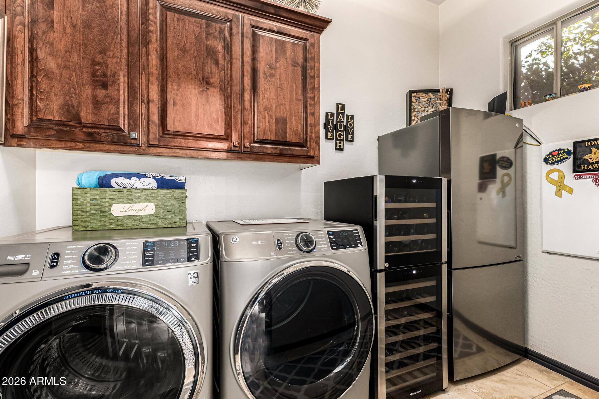 3418 East Pyrenees Pass Phoenix, AZ 85018 - Photo 29 of 46 a view of utility room with washer and dryer