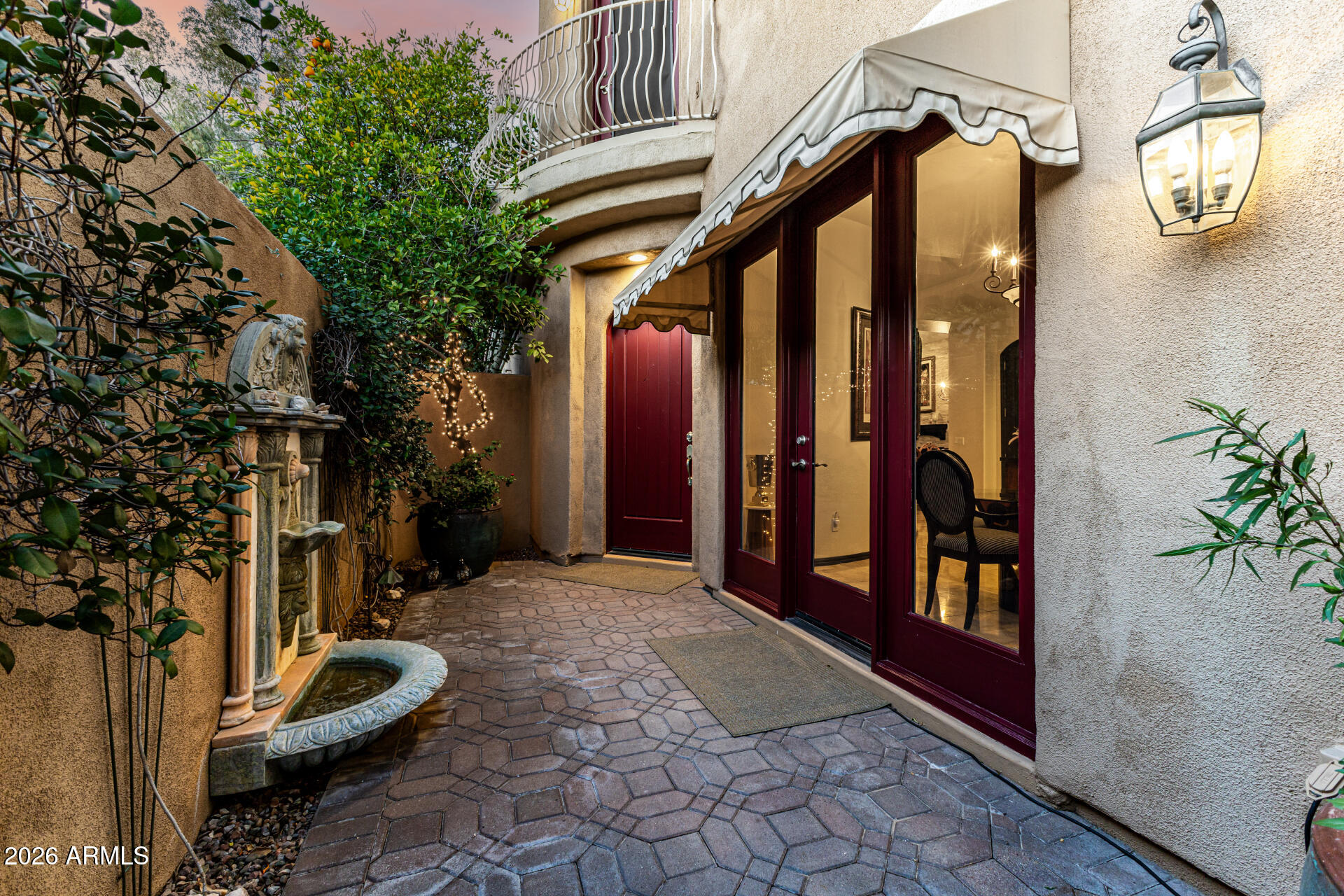 3418 East Pyrenees Pass Phoenix, AZ 85018 - Photo 3 of 46 a view of a porch with seating space