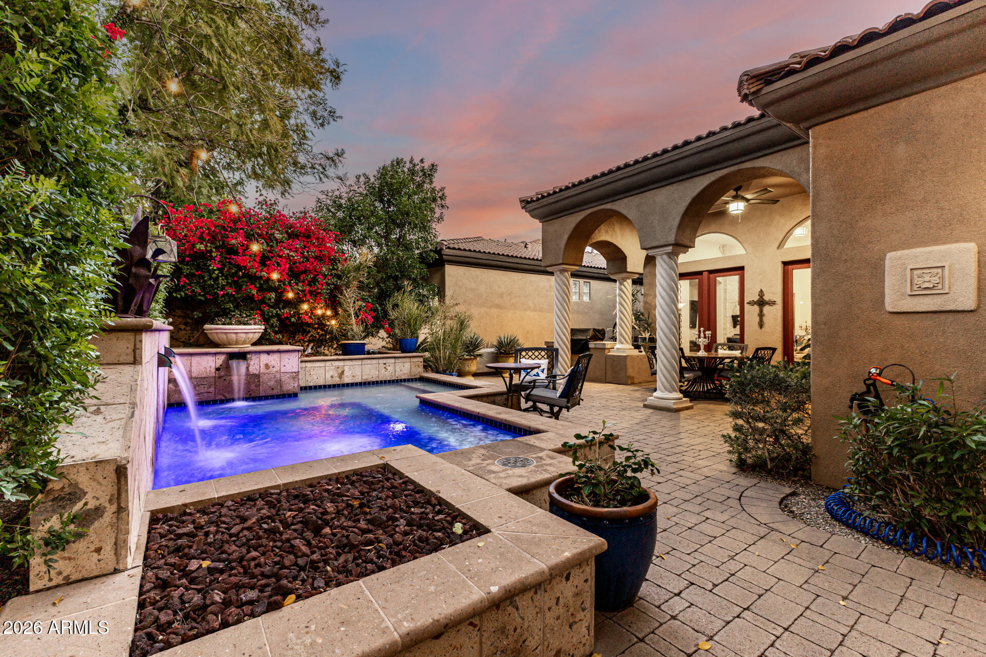 3418 East Pyrenees Pass Phoenix, AZ 85018 - Photo 34 of 46 a view of a chairs and tables in the patio