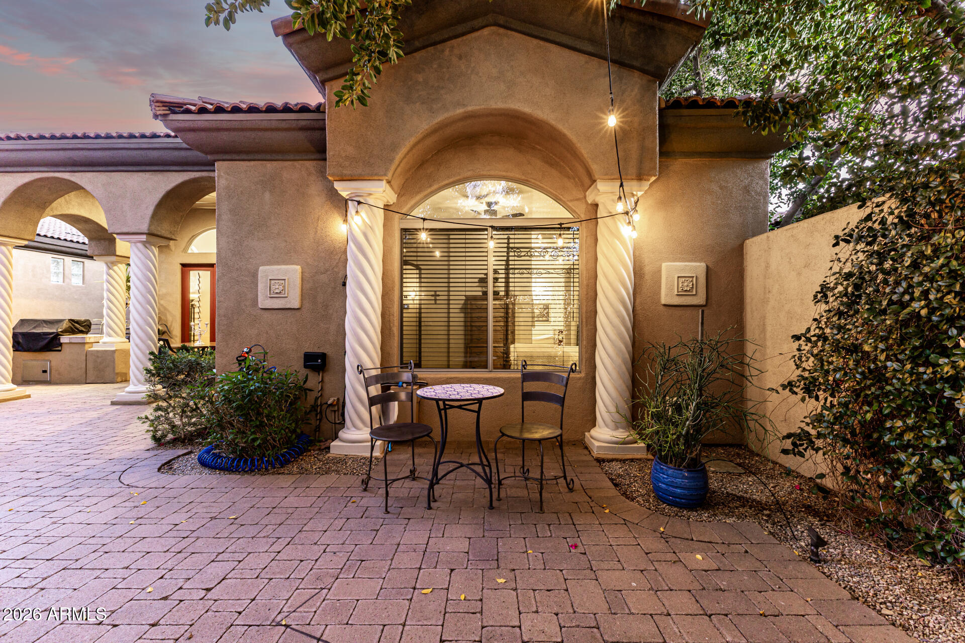 3418 East Pyrenees Pass Phoenix, AZ 85018 - Photo 36 of 46 a view of a house with outdoor seating space