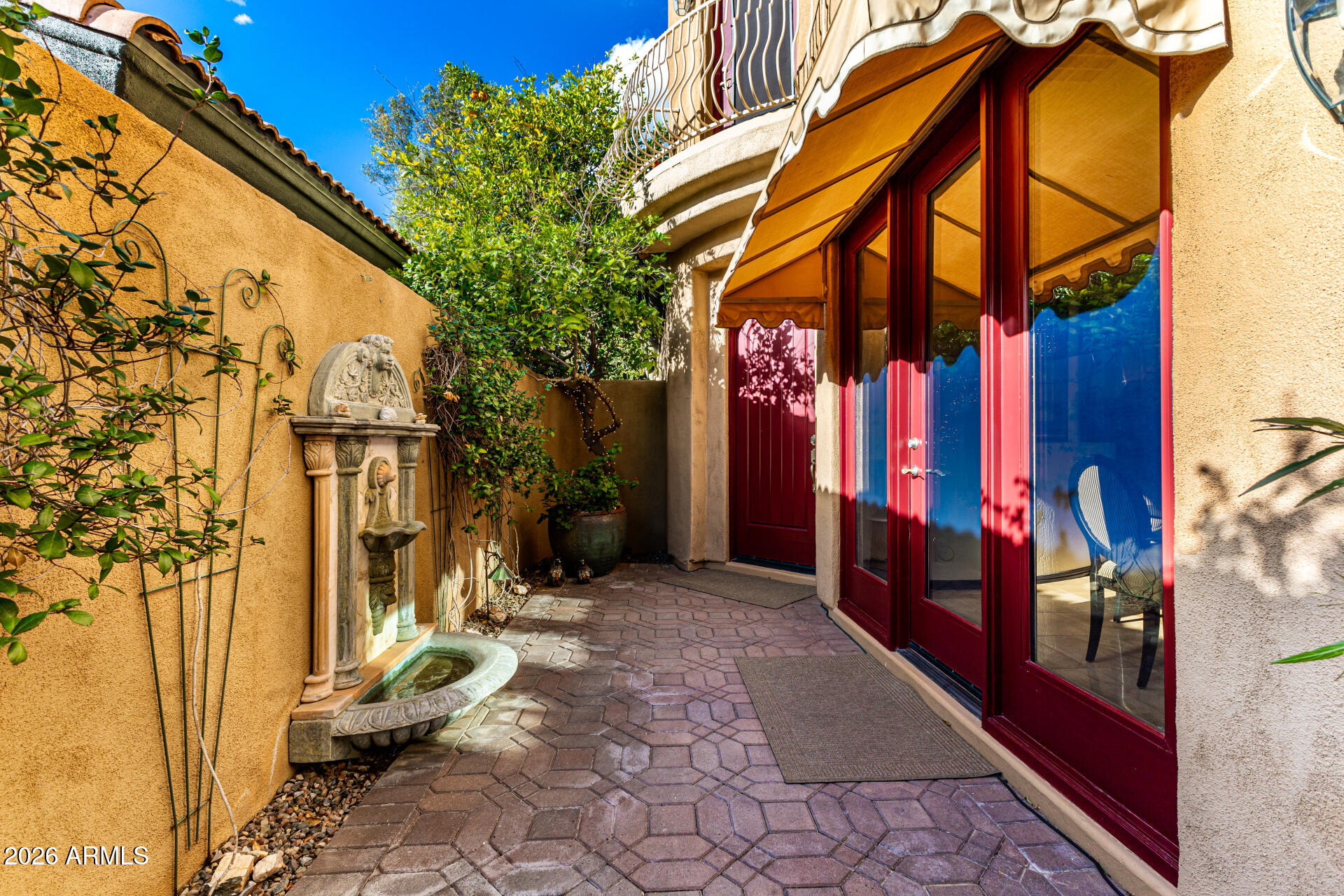 3418 East Pyrenees Pass Phoenix, AZ 85018 - Photo 5 of 46 a view of a building with a tree