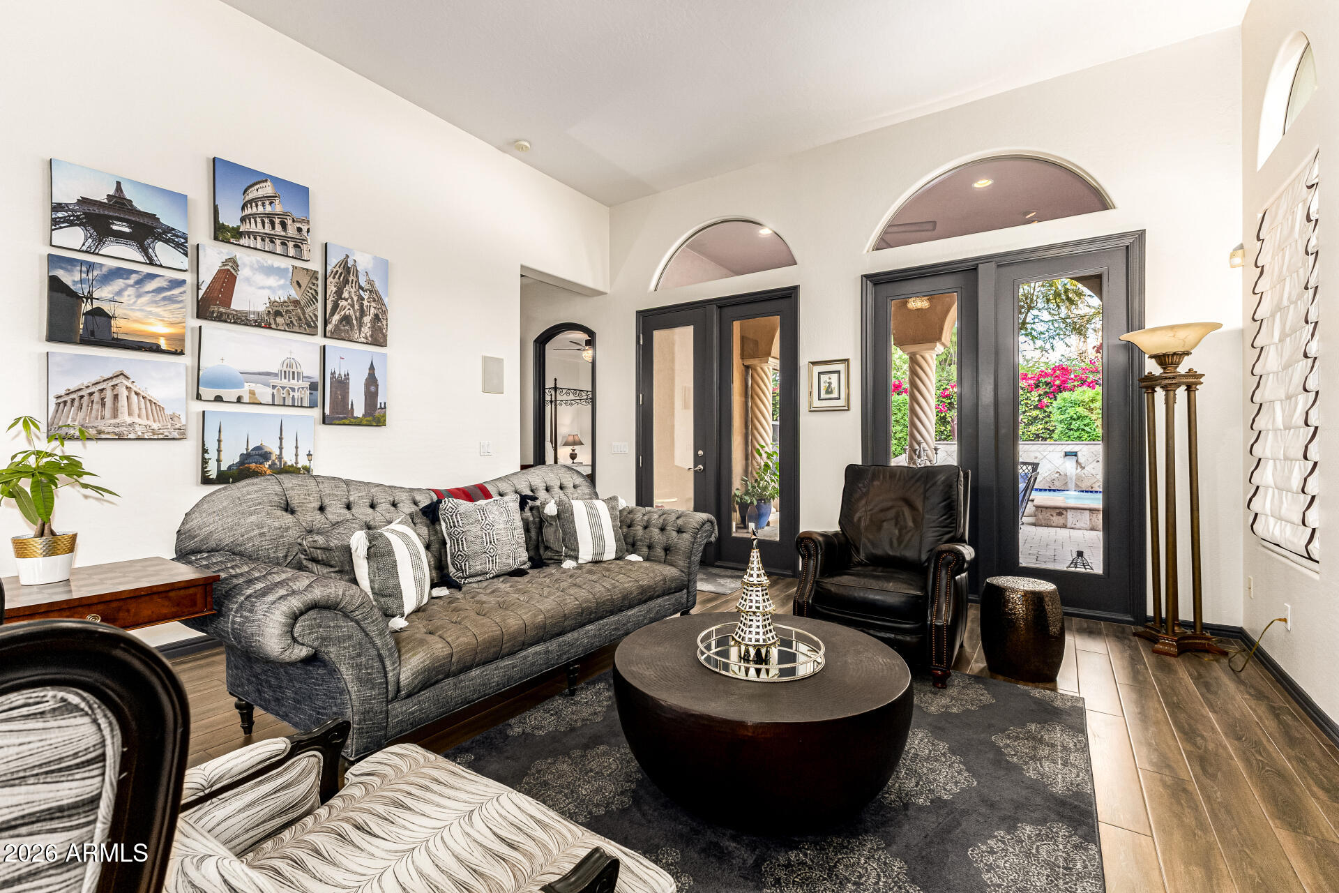 3418 East Pyrenees Pass Phoenix, AZ 85018 - Photo 8 of 46 a living room with furniture and a large window