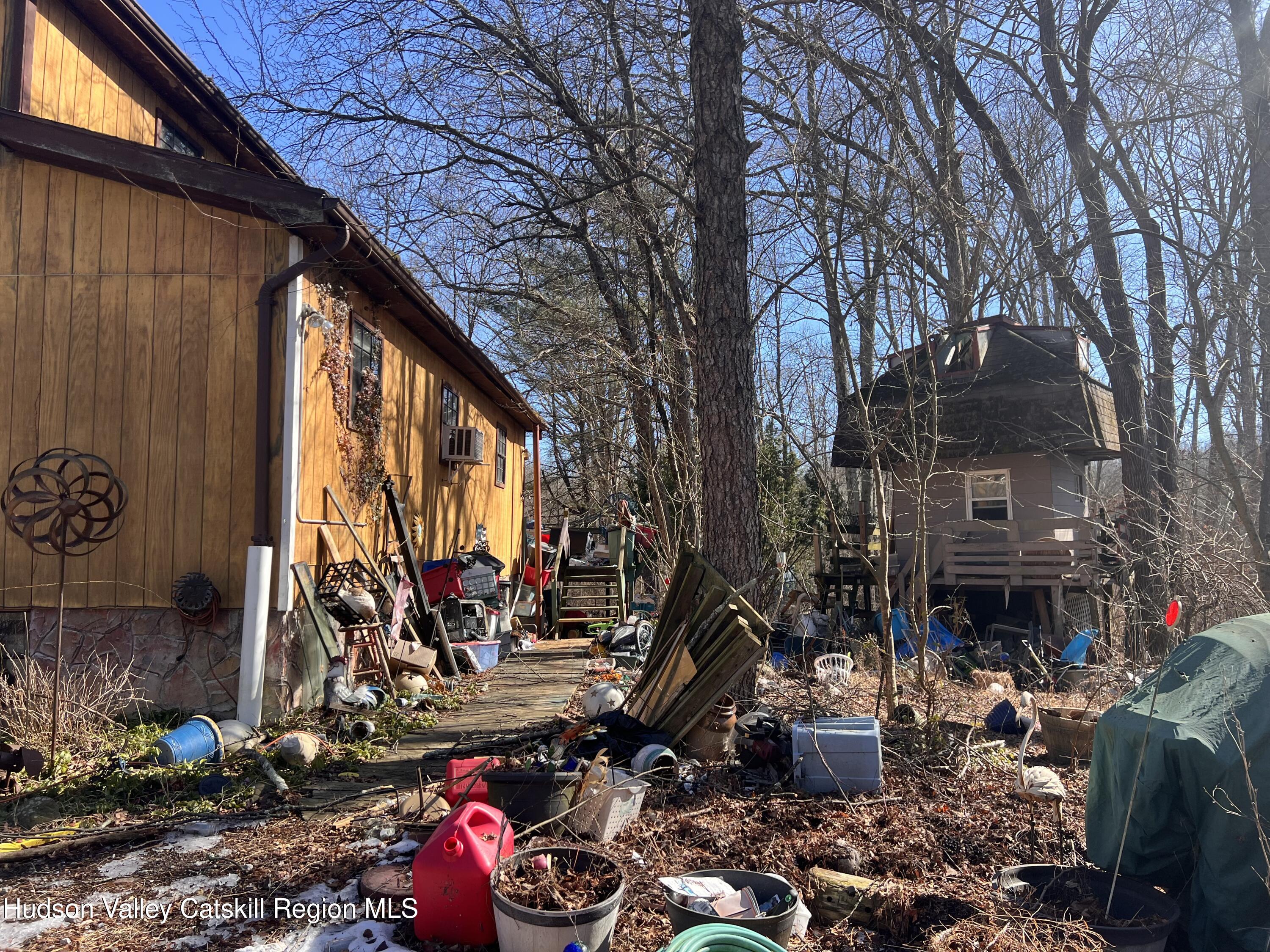 2439 Bruynswick Road Wallkill, NY 12589 - Photo 3 of 10 a view of a room with cars parked